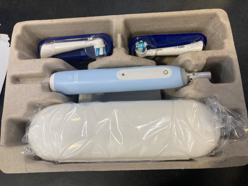 Photo 1 of Oral-B iO Deep Clean Rechargeable Electric Powered Toothbrush, Icy Blue with iO Series 3 Limited, 2 Brush Heads and Travel Case - Pressure Sensor to Protect Gums - 3 Cleaning Settings - 2 Minute Timer