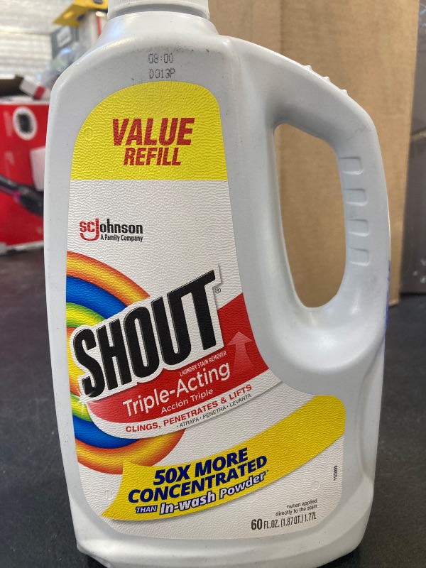Photo 1 of Shout Active Enzyme Laundry Stain Remover Spray for Clothes, Triple-Acting Formula Clings, Penetrates, and Lifts Tough & Everyday Stains - Prewash Refill 60oz (1.7L)