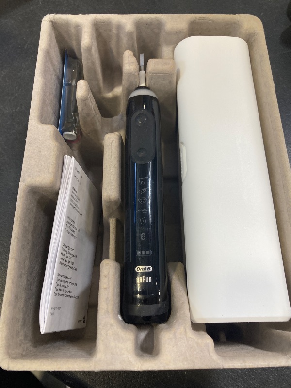 Photo 1 of Oral-B Genius X Limited Rechargeable Electric Toothbrush with 1 Replacement Brush Head, Travel Case, Midnight Black