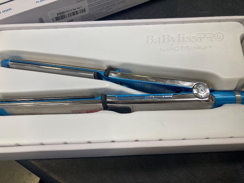 Photo 1 of BaBylissPRO Nano Titanium 1 1/2" Prima Stainless Steel Ionic Hair Straightener, Curl and Straighten Hair with one professional tool