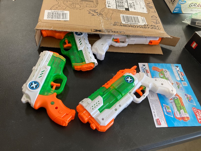 Photo 1 of X-Shot Nano Fast Fill (2 Pack) + Micro Fast-Fill (2 Pack) by ZURU Refresh Watergun, X Shot Water Toys, 4 Blasters Total, (Fills with Water in just 1 Second!)