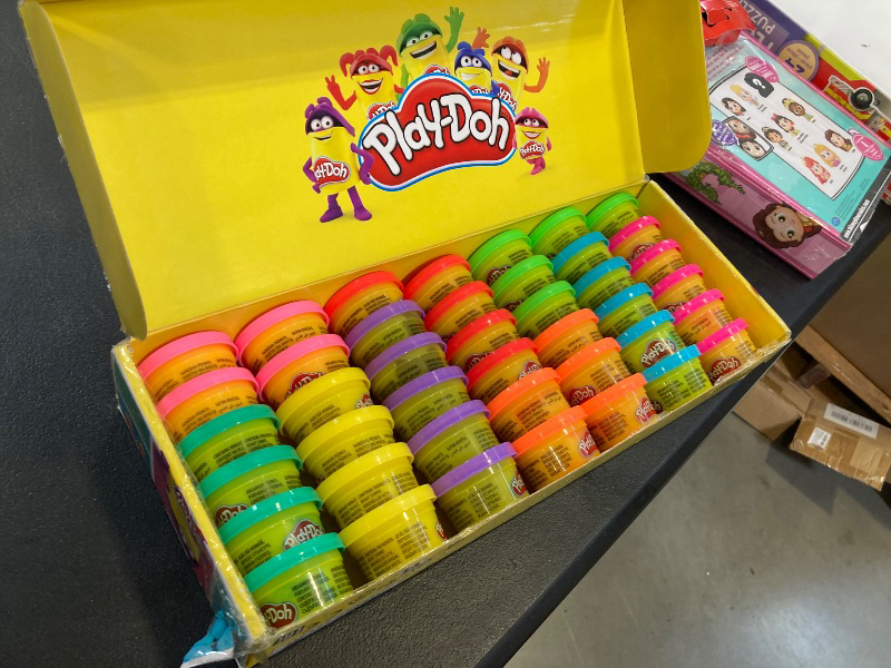 Photo 1 of Play Doh Bulk Handout 42-Pack of 1-Ounce Modeling Compound Cans, Non Candy Halloween Handout Toys & Party Favors, Kids Arts & Crafts, Preschool Toys, Ages 2+ (Amazon Exclusive)