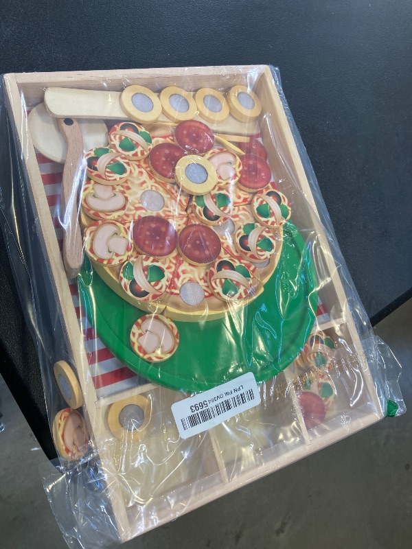 Photo 1 of Melissa & Doug Pizza Party Wooden Pretend Play Food Set With 36 Toppings, Preschool Toy Pretend Food, Play Wooden Pizza And Cutter, Toy For Kids Ages 3+