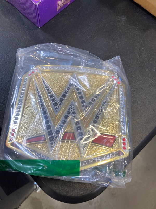 Photo 1 of Mattel WWE Championship Title, Undisputed WWE Universal Championship Role-Play & Costume Accessory, Wearable Leather-like Belt 3+ Feet with One-Time Adjustment