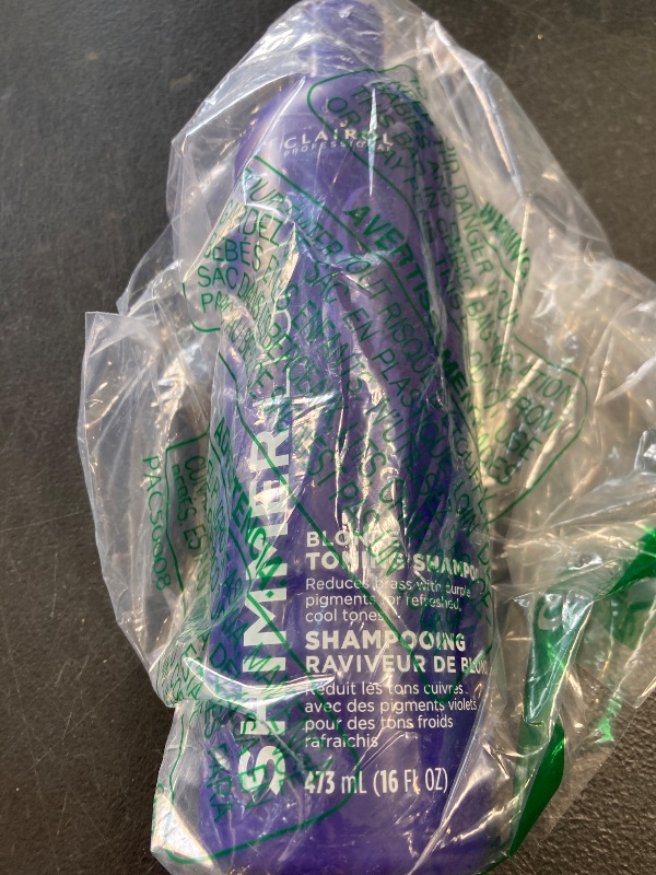 Photo 1 of Clairol Professional Shimmer Lights Purple Shampoo, 16 fl. Oz, Neutralizes Brass & Yellow Tones, For Blonde, Silver, Gray & Highlighted Hair Packaging May Vary