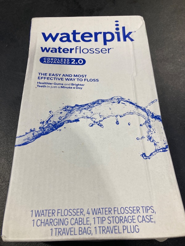 Photo 1 of Waterpik Cordless Advanced 2.0 Water Flosser For Teeth, Gums, Braces, Dental Care With Travel Bag and 4 Tips, ADA Accepted, Rechargeable, Portable, and Waterproof, White WP-580, Packaging May Vary