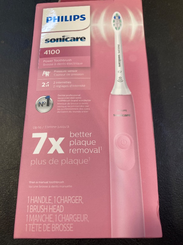 Photo 1 of Philips Sonicare 4100 Rechargeable Electric Toothbrush, with Pressure Sensor, 2 Intensity Settings, SmarTimer and QuadPacer, 14-Day Battery Life, Deep Pink, Model HX3681/26