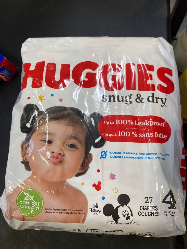 Photo 1 of Huggies Size 4 Diapers, Snug & Dry Baby Diapers, Size 4 (22-37 lbs), 27 Count, Packaging May Vary