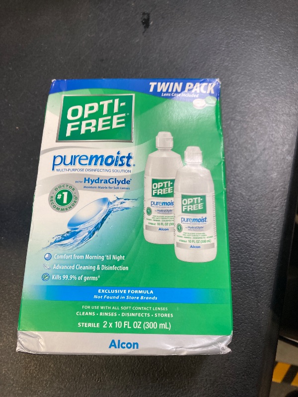 Photo 1 of Opti-Free Puremoist Multi-Purpose Contact Lens Cleaning and Disinfecting Solution with Lens Case, 20 Fl Oz (pack of 2- 10oz bottles) exp- 09/2027