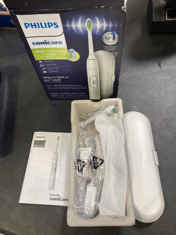 Photo 1 of PHILIPS Sonicare ProtectiveClean 6100 Rechargeable Electric Toothbrush, with Pressure Sensor, 3 Cleaning Modes, SmarTimer and QuadPacer, 14-Day Battery Life, Travel Case, White, Model HX6877/21