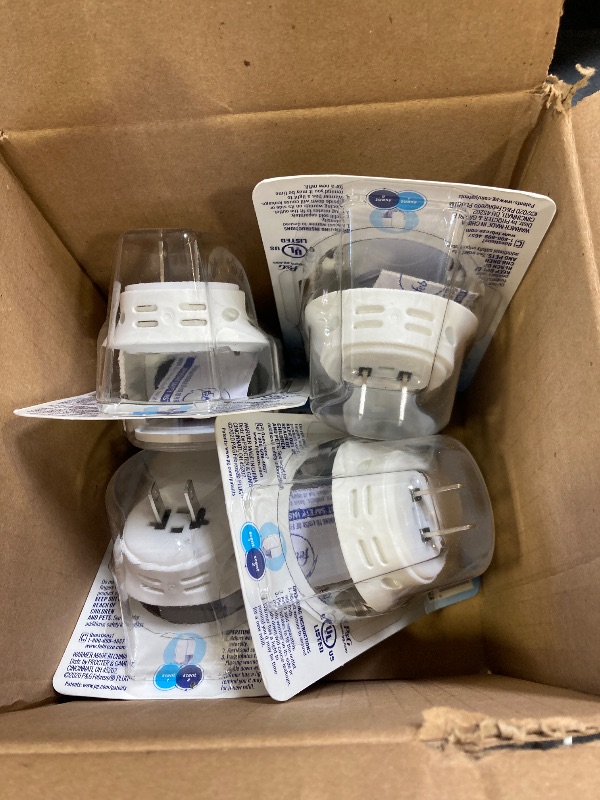 Photo 1 of Febreze Plug In Air Freshener Fade Defy Plugs, Scented Oil Warmer- Pack of 4