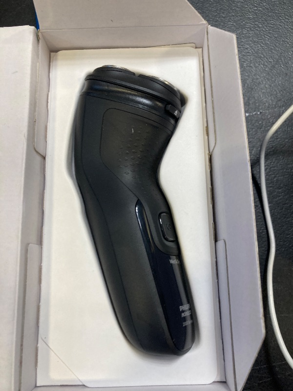 Photo 1 of Philips Norelco Shaver 2400 Series, Wet and Dry Electric Shaver, Pop-up Trimmer, P-Cap, Deep Black, Model X3001/90