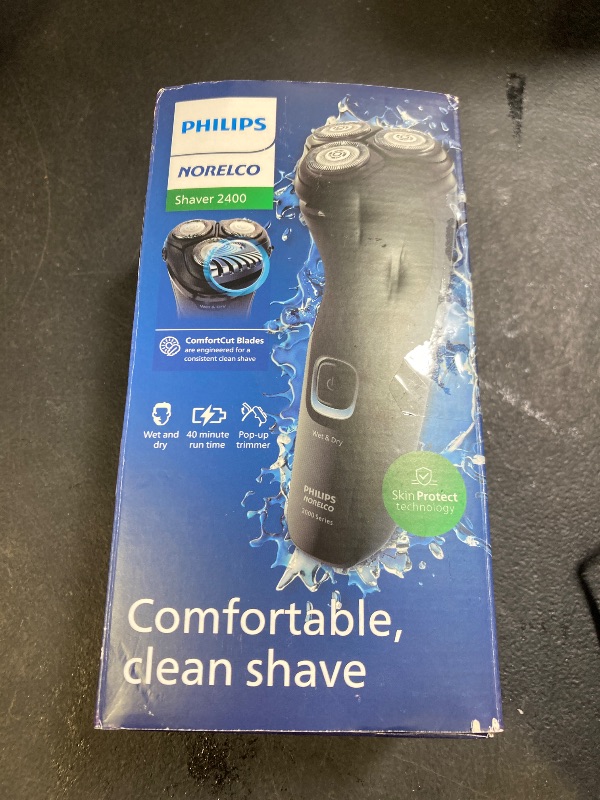 Photo 1 of Philips Norelco Shaver 2400 Series, Wet and Dry Electric Shaver, Pop-up Trimmer, P-Cap, Deep Black, Model X3001/90