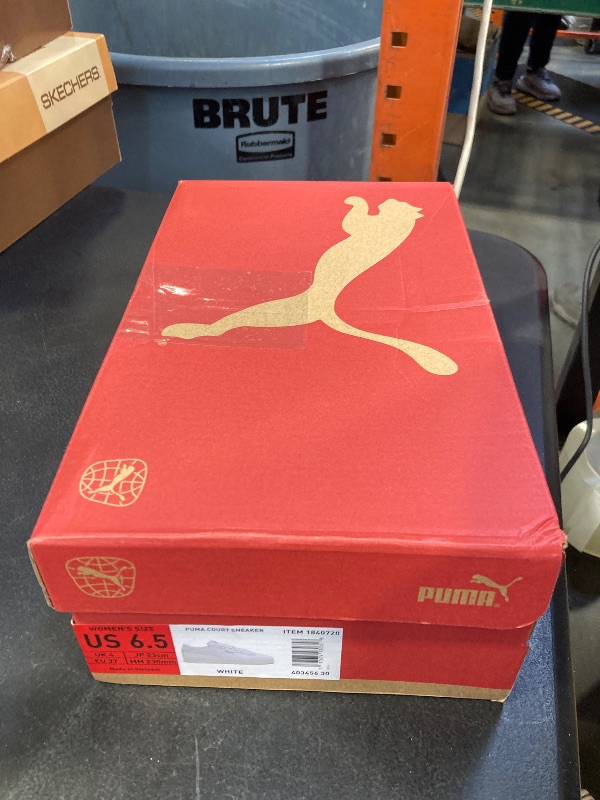 Photo 1 of PUMA Women's Carina Street Sneaker
size 6.5