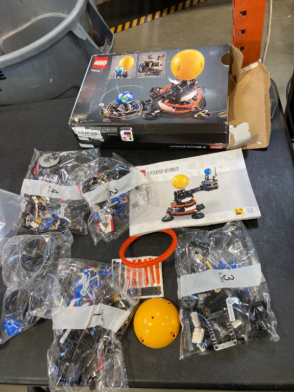 Photo 1 of LEGO Technic Planet Earth and Moon in Orbit Building Set, Outer Space Birthday Gift for 10 Year Olds, Solar System Space Toy for Imaginative, Independent Play, Space Room Décor for Boys & Girls, 42179