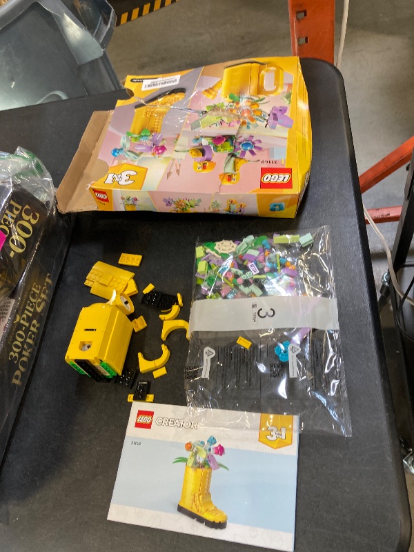 Photo 1 of LEGO Creator 3 in 1 Flowers in Watering Can Building Toy Set - Fun, Creative Activity for Kids, Girls and Boys, Ages 8+ - Options to Build Rain Boots or Birds - 31149