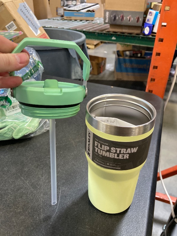 Photo 1 of Stanley IceFlow Flip Straw Tumbler with Handle 20 oz | Twist On Lid and Flip Up Straw | Leak Resistant Water Bottle | Insulated Stainless Steel |BPA-Free | Citron