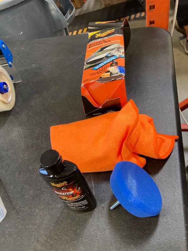 Photo 1 of Meguiar's Quik Scratch Eraser Kit, Car Scratch Remover for Repairing Surface Blemishes, Car Care Kit with ScratchX, Drill-Mounted Pad, and Microfiber Towel, 4 Count