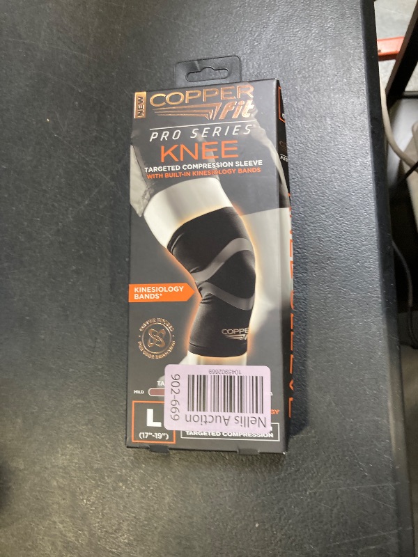 Photo 1 of Copper Fit Pro Series Compression Knee Sleeve, Black with Copper Trim, Large, Packaging may Vary