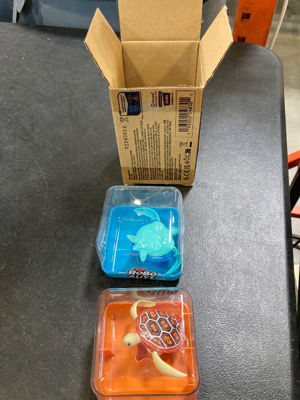 Photo 1 of ROBO ALIVE Robo Turtle Robotic Swimming Turtle (Orange + Blue) by ZURU Water Activated, Comes with Batteries, Amazon Exclusive (2 Pack)