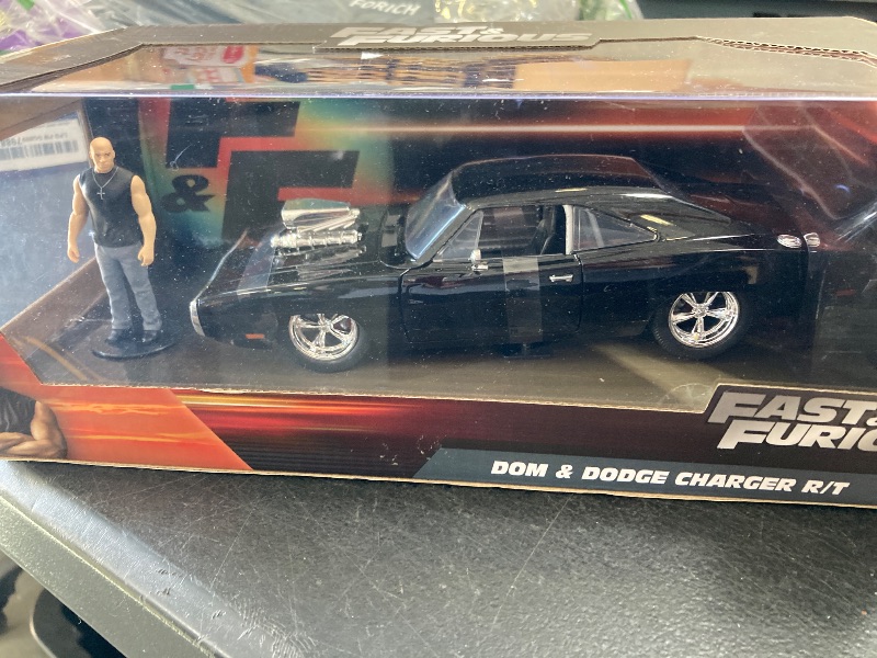 Photo 1 of Fast & Furious 1:24 Dom's Dodge Charger Die-cast Car & 2.75" Dominic Toretto Figure, Toys for Kids and Adults