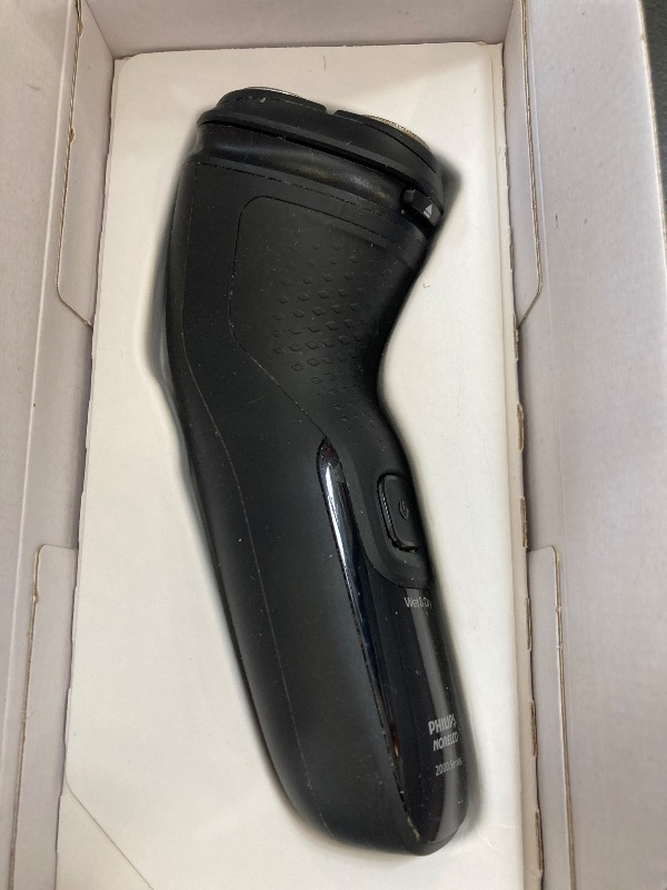 Photo 1 of Philips Norelco Shaver 2400 Series, Wet and Dry Electric Shaver, Pop-up Trimmer, P-Cap, Deep Black, Model X3001/90