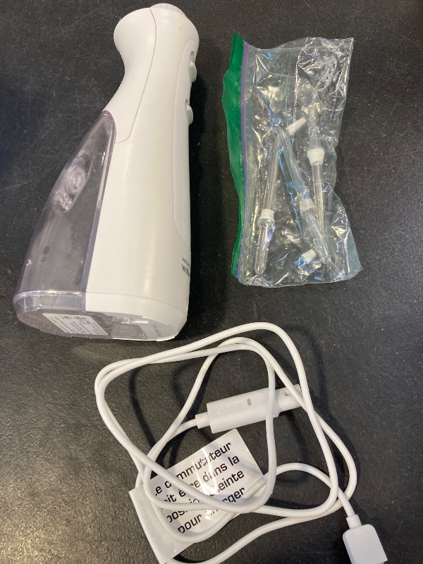 Photo 1 of Waterpik Cordless Advanced 2.0 Water Flosser For Teeth, Gums, Braces, Dental Care With Travel Bag and 4 Tips, ADA Accepted, Rechargeable, Portable, and Waterproof, White WP-580, Packaging May Vary