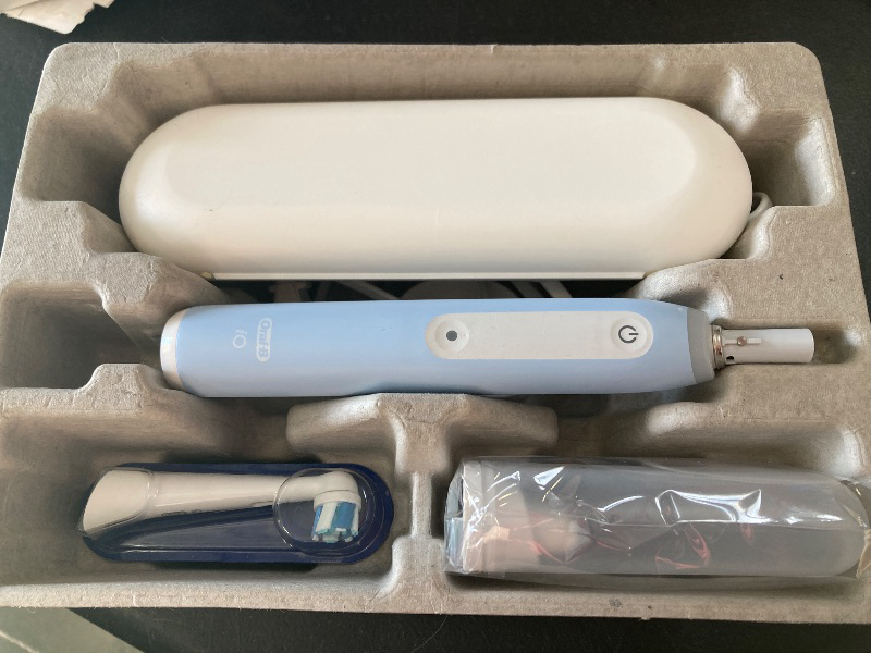 Photo 1 of Oral-B iO Deep Clean Rechargeable Electric Powered Toothbrush, Icy Blue with iO Series 3 Limited, 2 Brush Heads and Travel Case - Pressure Sensor to Protect Gums - 3 Cleaning Settings - 2 Minute Timer