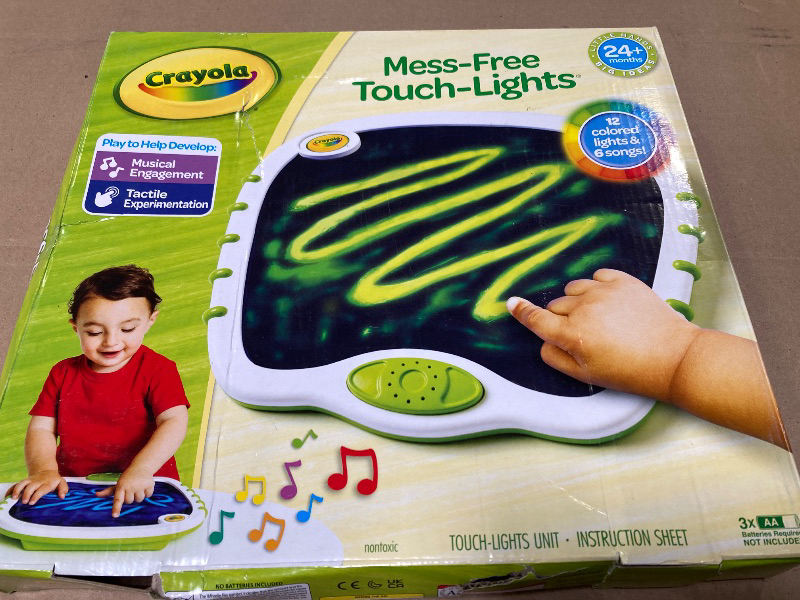 Photo 1 of Crayola Toddler Touch Lights, Musical Sensory Toys for Toddlers, Light Up Drawing Pad, Mess Free Painting, Travel Activity, Gift for Toddlers, 2+