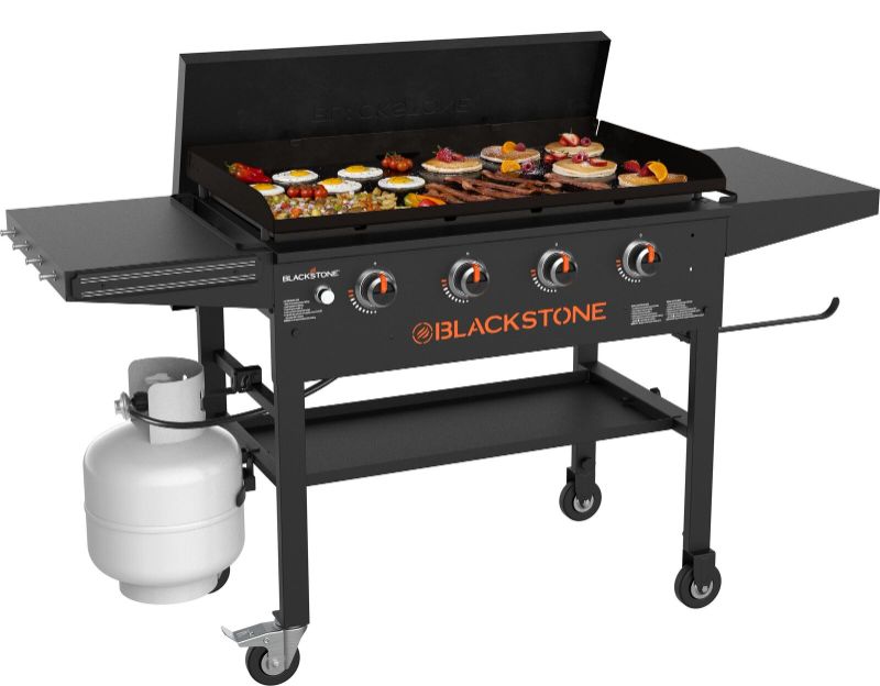 Photo 1 of Blackstone Original 4-Burner 36" Propane Omnivore Outdoor Griddle with Hood and Folding Side Shelves
