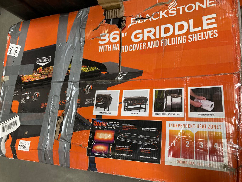 Photo 1 of Blackstone Original 4-Burner 36" Propane Omnivore Outdoor Griddle with Hood and Folding Side Shelves