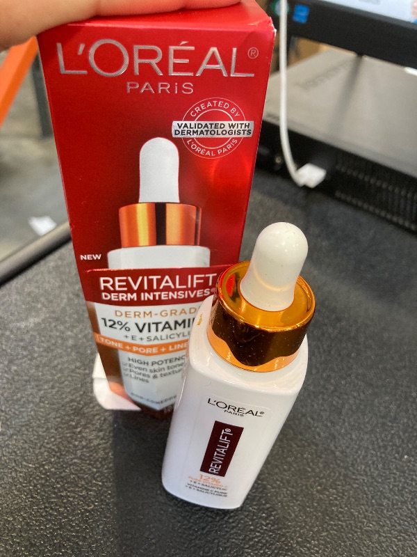 Photo 1 of L'Oreal Paris Revitalift 12% Pure Vitamin C Serum, Brightening Serum For Face with Vitamin E, Salicylic Acid, 1 oz + Moisturizer Sample