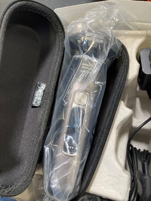 Photo 1 of Philips Norelco Shaver Series 9000, Wet and Dry Electric Shaver, with Lift & Cut Shaving System and SenseIQ Technology, Pop-up Trimmer, Cleaning Pod, Charging Stand and Travel Case, Model S9987/85