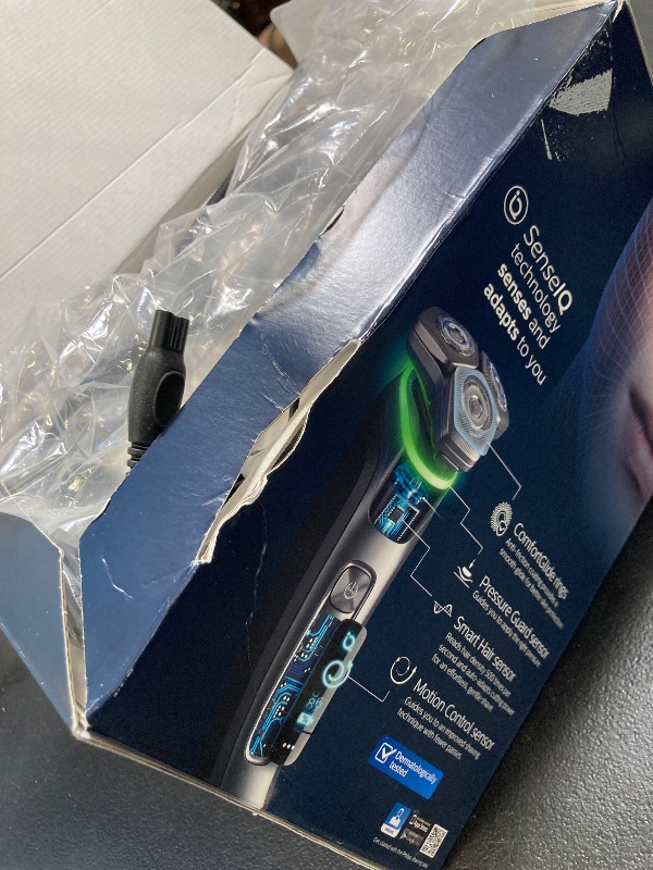 Photo 1 of Philips Norelco Shaver Series 9000, Wet and Dry Electric Shaver, with Lift & Cut Shaving System and SenseIQ Technology, Pop-up Trimmer, Cleaning Pod, Charging Stand and Travel Case, Model S9987/85
