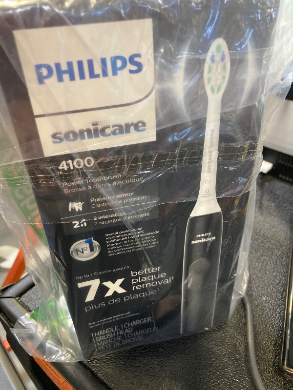 Photo 1 of Philips Sonicare 4100 Rechargeable Electric Toothbrush, with Pressure Sensor, 2 Intensity Settings, SmarTimer and QuadPacer, 14-Day Battery Life, Black, Model HX3681/24