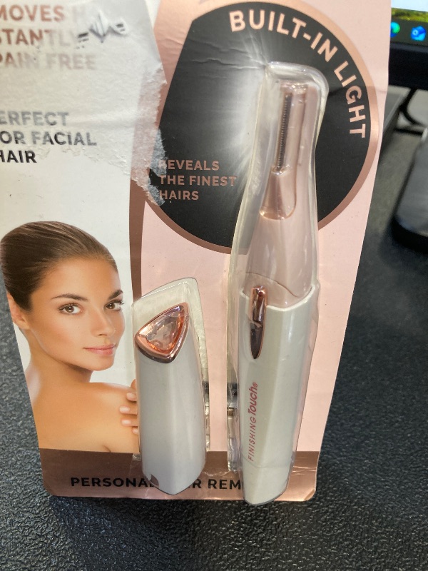Photo 1 of Finishing Touch Lumina Painless Hair Remover, Silver
