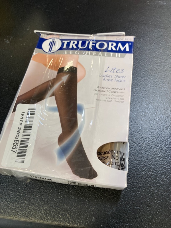 Photo 1 of Truform Sheer Compression Stockings, 8-15 mmHg, Women's Knee High Length, 20 Denier, Nude, Medium