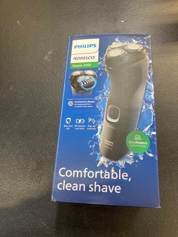 Photo 1 of Philips Norelco Shaver 2400 Series, Wet and Dry Electric Shaver, Pop-up Trimmer, P-Cap, Deep Black, Model X3001/90