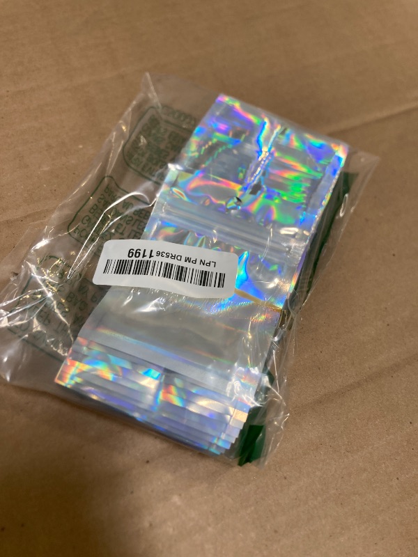 Photo 1 of 100 Pack Holographic Bags, 3'' x 4‘’ Small Bags for Small Business, Resealable Smell Proof Bags, Rainbow Color Mylar Packing Bag, Holographic Zipper Bag for Food Storage, Candy & Jewelry Packaging