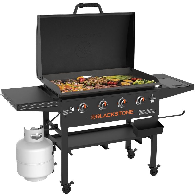Photo 1 of Blackstone Original 4-Burner 36” Propane Griddle with Hood and Omnivore Griddle Plate