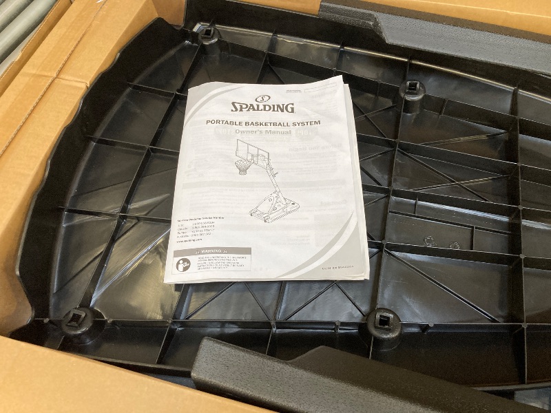 Photo 1 of Spalding 54 Inch Shatter-proof Polycarbonate Exacta Height® Portable Basketball Hoop System
