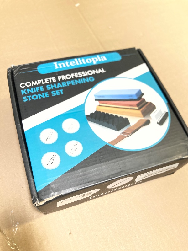 Photo 1 of Intelitopia Complete Knife Sharpening Stone Set – Dual Grit Whetstone 400/1000 3000/8000 Knife Sharpener with Leather Strop, Flattening Stone, Bamboo Base, 3 Non-slip Rubber Bases & Angle Guide