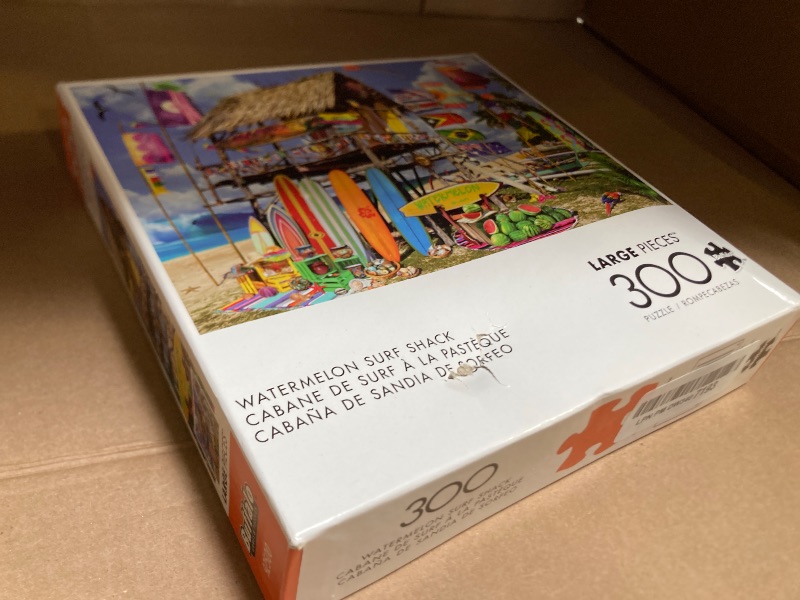 Photo 1 of Buffalo Games - Garry Walton - Watermelon Surf Shack - 300 Piece Jigsaw Puzzle for Adults -Challenging Puzzle Perfect for Game Nights - Finished Size is 21.25 x 15.00