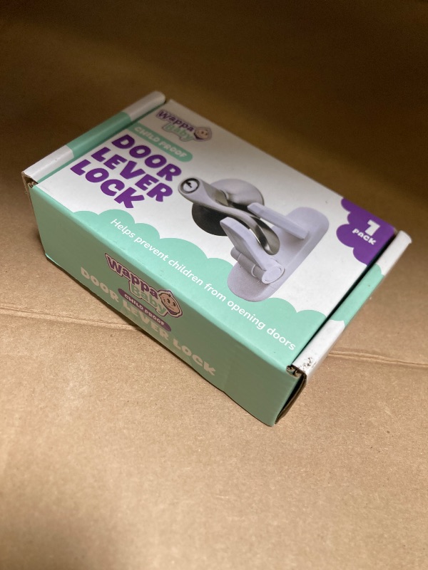 Photo 1 of Door Lever Lock (1 Pack) Prevents Toddlers from Opening Doors. 3.25" L * 1.5" W * 4.5" H Easy One Hand Operation for Adults. Durable ABS with 3M Adhesive Backing. Simple Install, No Tools Needed.