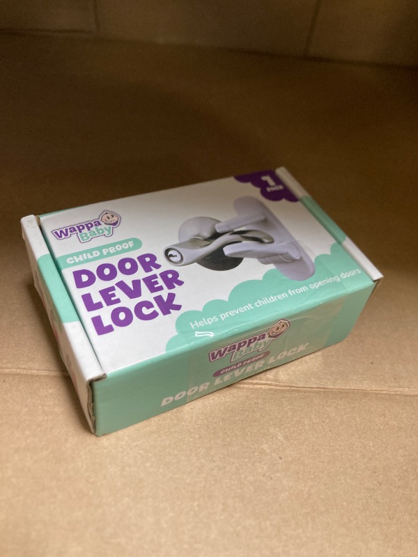 Photo 1 of Door Lever Lock (1 Pack) Prevents Toddlers from Opening Doors. 3.25" L * 1.5" W * 4.5" H Easy One Hand Operation for Adults. Durable ABS with 3M Adhesive Backing. Simple Install, No Tools Needed.