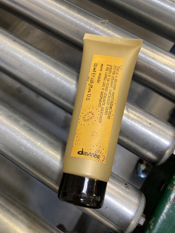Photo 1 of Davines This is a Relaxing Moisturizing Fluid, Heat Protection And Frizz Control For Sleek And Straight Styling, Moisturize With Humidity Control, 4.22 Fl. Oz.