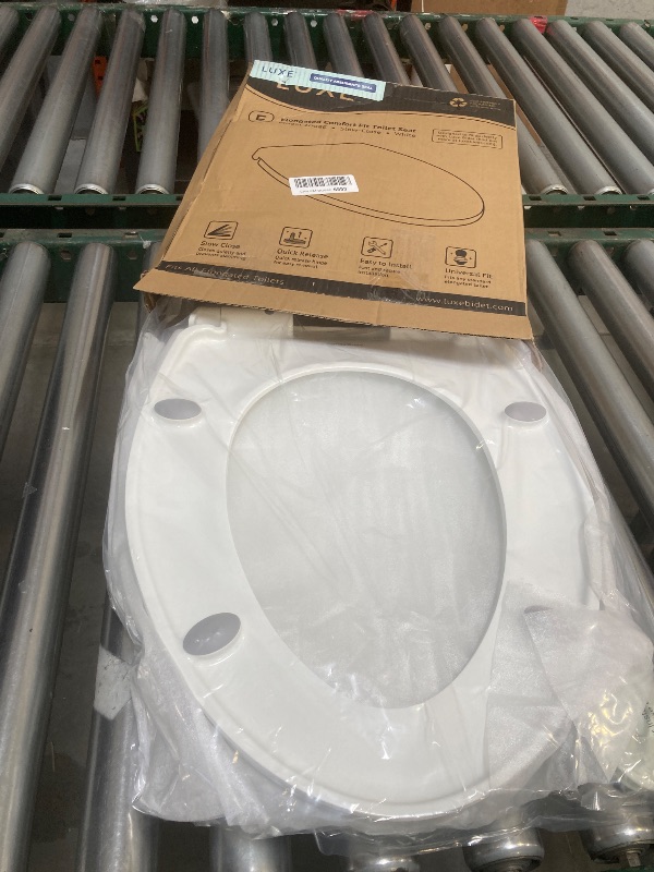 Photo 1 of LUXE TS1008E Elongated Comfort Fit Toilet Seat with Slow Close, Quick Release Hinges, and Non-Slip Bumpers (White)