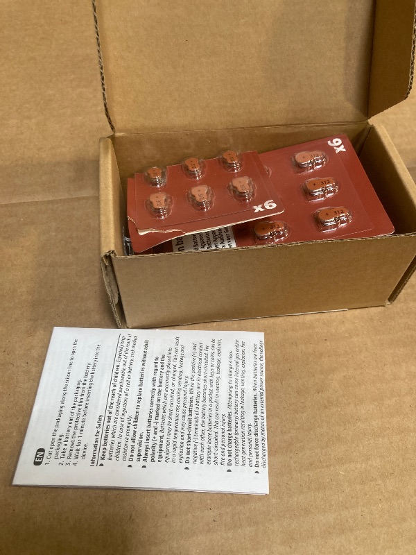 Photo 1 of Amazon Basics 60-Pack Hearing Aid Size 312 Zinc-Air Batteries, 1.45 Volt, Brown Tab, 4-Year Shelf Life