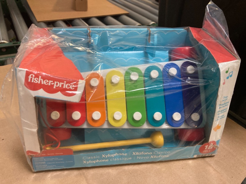 Photo 1 of Fisher-Price Toddler Pull Toy, Classic Xylophone Pretend Musical Instrument with Mallet and Rolling Wheels for Ages 18+ Months
