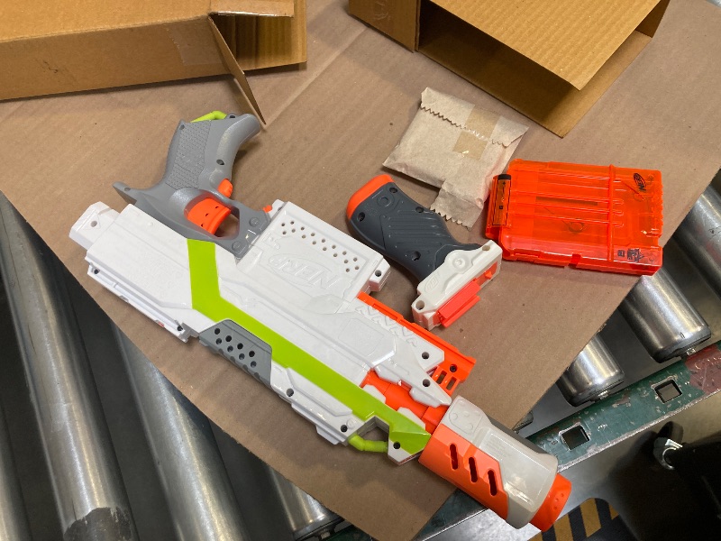 Photo 1 of Nerf Modulus Stryfe Motorized Blaster - Fires 6 Darts in a Row - Includes Drop Grip, Barrel Extension, 6-Dart Clip, 6 Nerf Elite Darts 